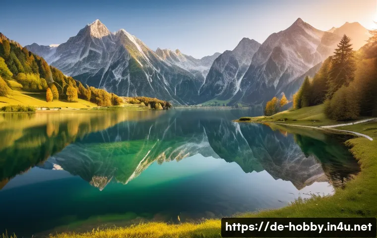일출 일몰 촬영 - A breathtaking sunrise over the rugged Bavarian Alps, featuring soft golden light illuminating snow-...